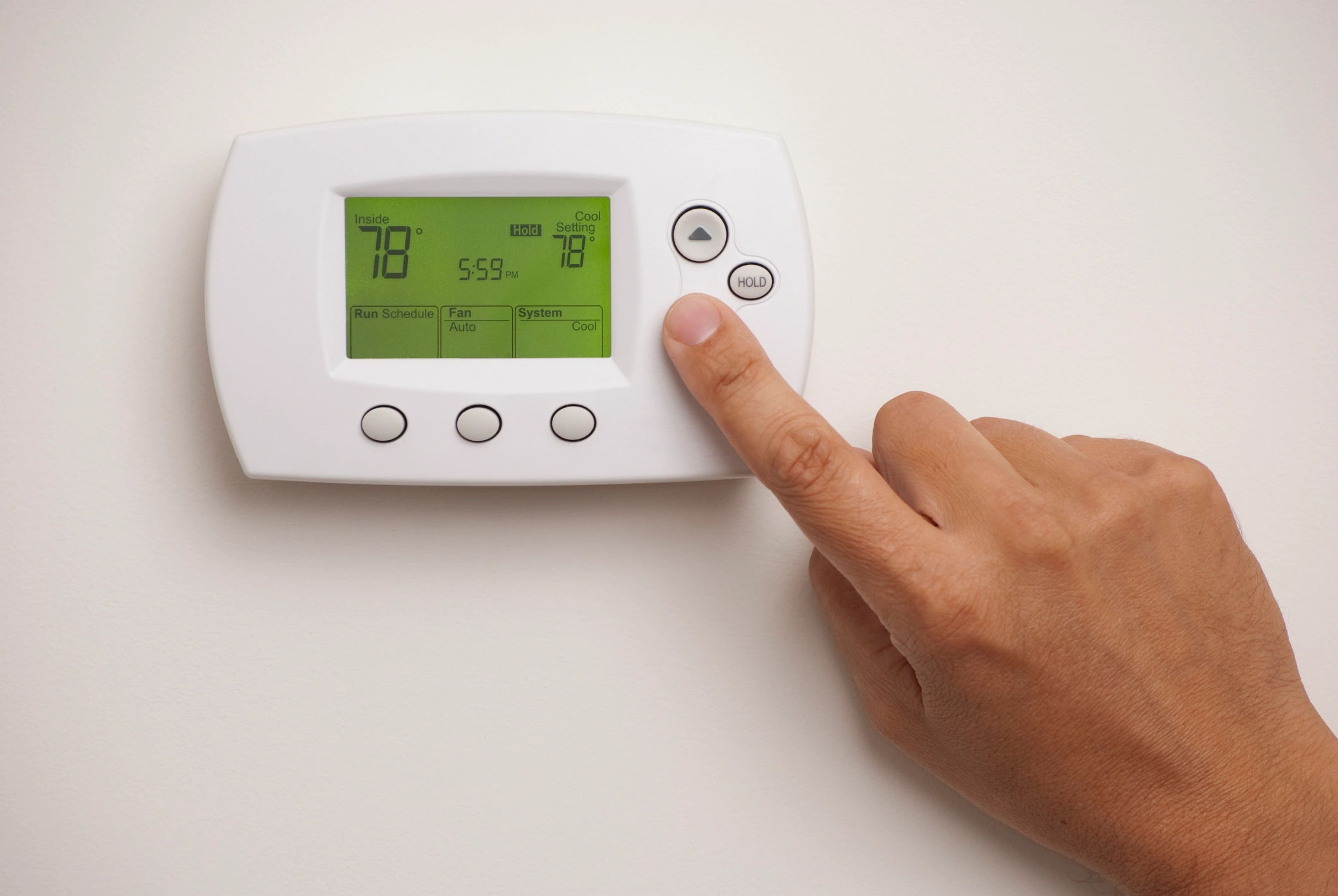 Man choosing the right thermostat for your home